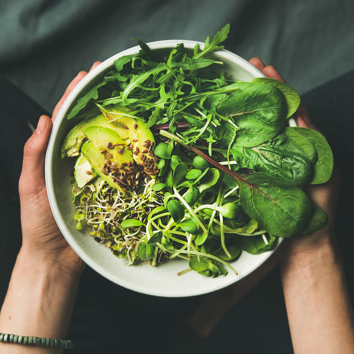 Green,Vegan,Breakfast,Meal,In,Bowl,With,Spinach,,Arugula,,Avocado,